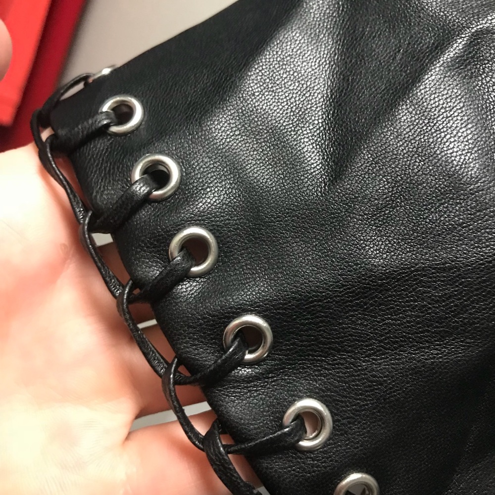 Leather like skirt with eyelet detail
